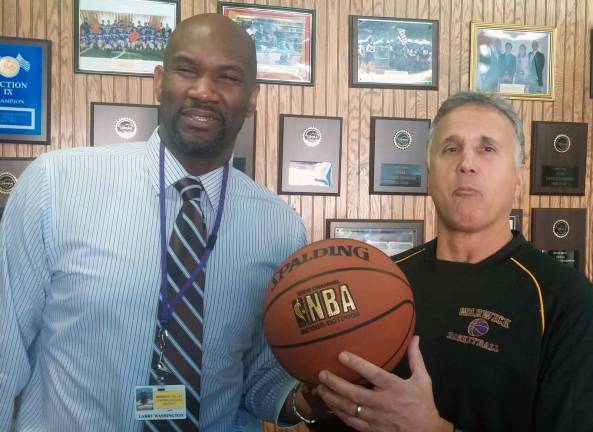 Warwick Valley High School principal makes local court debut Dr. Larry Washington, the principal at Warwick Valley High School, and physical education teacher Tom Folino get ready for the 19th annual Faculty Basketball Game this Friday, March 6t, at the high school gym.