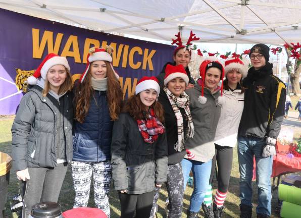 Warwick High School Crew Team raises funds during Santa's visit to Railroad Green Warwick High School Crew Team raises funds during Santa's visit to Railroad Green
