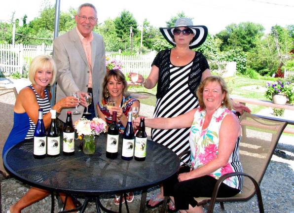 The summer mix Photo by Roger Gavan Planning for the upcoming wine tasting mixer at Applewood Winery. From left, Event Chair Janine Dethmers, Warwick Valley Chamber of Commerce Executive Director Michael Johndrow, Applewood Winery tasting room server Lisa Wood, owner Michele Hull and Wine Club Manager Vicky Hague.