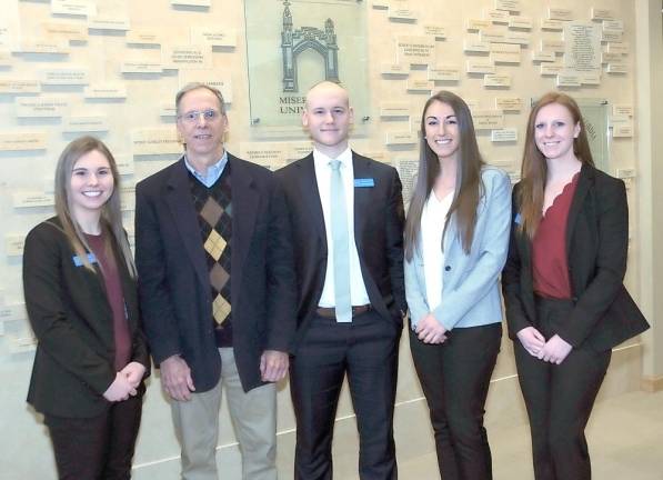The Misericordia University student student-faculty researchers, from left are; Bridget Boyle, Dallas, Pa.; Professor Richard Haydt; Kristian Dyrli, Dallas, Pa.; Megan Meyers, Lancaster, Pa., and Samantha Weissberg, Warwick, N.Y., presented, “A Comparison of Platelet Rich Plasma and Oxygen Ozone Injections in Patients with Knee Osteoarthritis: A Systematic Review,’’ at the conference on campus and at the American Congress of Rehabilitation Medicine 96th Annual Conference in Chicago, Illinois.