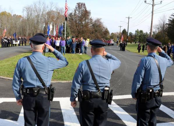 VFW Post 4662 Commander John Jose Morales led the parade and then opened the official ceremony with the Pledge of Allegiance and the National Anthem sung by The Meistersingers.