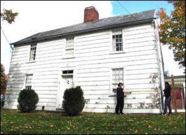 Work begins on restoration of historic Shingle House Work begins on restoration of historic Shingle House