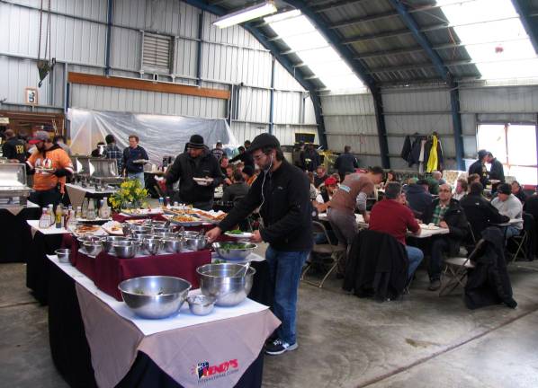 Who was that man in the black SUV? Photos by Roger Gavan The main hanger served as a restaurant for actors and technicians.