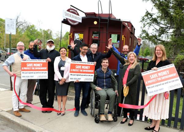 Photo by Roger Gavan On Thursday, May 9, Mayor Michael Newhard (left) and members of the Warwick Valley Chamber of Commerce joined representatives of Solstice to celebrate membership in the Chamber with a ribbon cutting ceremony at the Chamber&#x2019;s South Street &#x201c;Caboose&#x201d; office.