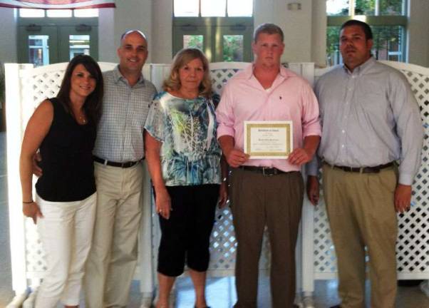 Morgan Thonus and Matthew Ulrich awarded $1,000 Robert F. Helmrich Memorial scholarships Members of Robert F. Helmrich's family - Kelly, Steve, Joey and Ricky Helmrich - share a moment with Matthew Ulrich (holding the certificate), one of two Warwick Valley High School students awarded $1,000 scholarships through the memorial fund created to recognize exceptional students who serve their community with the same spirit as he did as a police officer and youth sports organizer.