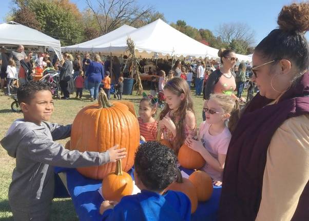 One child managed to guess the weight of the pumpkin donated by Leonard DeBuck.