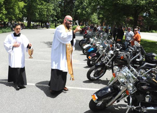 Warwick St. Stephen's eighth annual motorcycle blessing and ride scheduled for July 6 File photo by Roger Gavan The Rev. Angelo Micciulla, assisted by St. Joseph’s Seminary student Roger Kwan, blessed each motorcycle.
