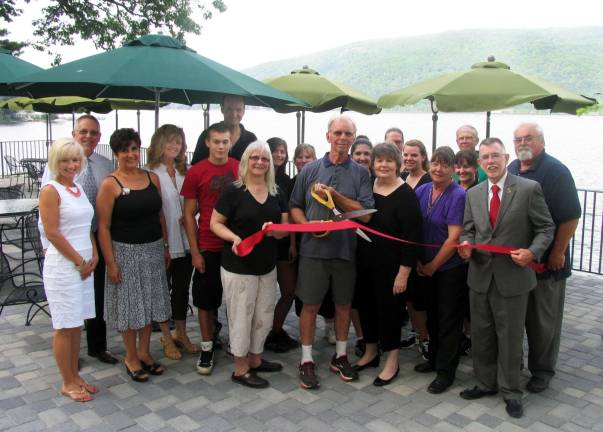 Continental Hotel celebrates grand opening of lakeside terrace Photo by Roger Gavan On Thursday evening, June 27, Town of Warwick Supervisor Michael Sweeton and members of the Warwick Valley and Greenwood Lake Chambers of Commerce joined owner Leo Stoeberl, his family and staff, for a ribbon-cutting ceremony at the New Continental Hotel and Restaurant. Holding the ribbon from left, Diane Stoeberl, owner Leo Stoeberl, his wife Joyce, her sister and general manager Pam Lehman and Supervisor Michael Sweeton.