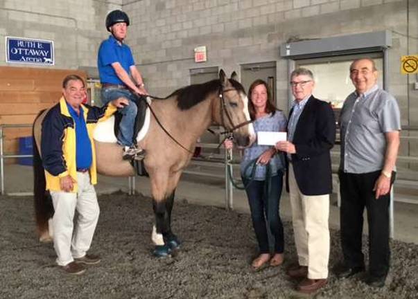 Rotarians donate $3,500 to Winslow Therapeutic Riding Center Rotarians donate $3,500 to Winslow Therapeutic Riding Center
