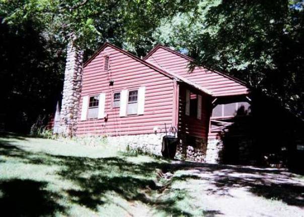 This wonderful property includes a pond, woods, waterfall, stream and three homes This wonderful property includes a pond, woods, waterfall, stream and three homes