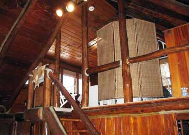 Charming log cabin offers year-round comfort, plus private beach on GWL Charming log cabin offers year-round comfort, plus private beach on GWL