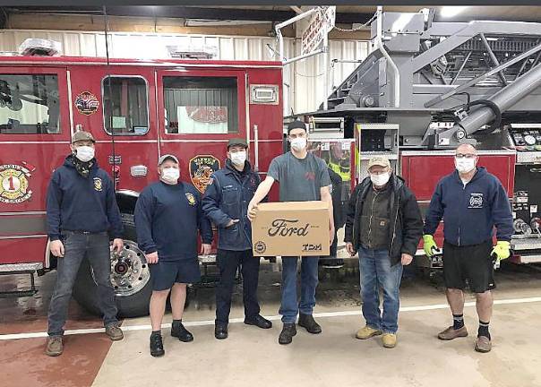 Warwick. Thank you, Leo Kaytes Ford On Monday, Dec. 28, 2020, the Warwick Fire Department received a donation of 2,200 face masks from the Ford Motor Company and to Leo Kaytes Ford of Warwick. “This donation will help prevent the spread of COVID-19 amongst our members and the community we serve,” said Michael Contaxis, the department’s 1st Assistant chief and its Fire Warwick Prevention chairman. “We greatly appreciate the donation. We thank Leo Kaytes Ford for always supporting the WFD and our community.” Photo provided by the Warwick Fire Department.
