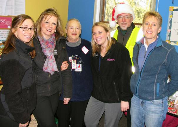 250 Christmas food baskets delivered Photos by Roger Gavan Warwick ShopRite employees were on hand to work with other volunteers. From left, ShopRite Dietician Jessica Atland, Front End Manager Patty Raniere, Food Pantry Co-coordinator Michelle Carter, Shopper Advocate Michelle Laurice, Jim Sciarra and Betsy Mitchell, co-owner of Track 7 Postal Center.