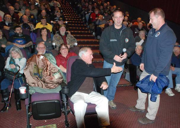 ShopRite gives $215K to Veterans Food Pantry Photo by Ed Bailey Orange County hosted a free showing of the movie “12 Strong” at the Town of Monroe Arts and Civic Center on Jan. 24 for veterans. The demand was such that a second showing was added. Prior to the movie Orange County Deputy Commissioner of Emergency Services Alan C. Mack discussed his experience as a helicopter pilot during Operation Enduring Freedom in Afghanistan in 2001. He is pictured here with County Executive Steven M. Neuhaus, center, and veteran Rich White of Warwick.