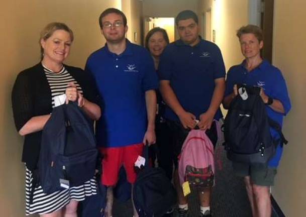 Catholic Charities receives backpack donation from St. Stephen’s Parish in partnership with Dignity Works Here Provided photo Catholic Charities received a donation of backpacks that were provided through a partnership between St. Stephen’s Parish in Warwick and the organization Dignity Works Here as part of their Operation Backpack Program. Sheila Toohey (left) of Catholic Charities accepted the donation from Dignity Works Here representatives Joe Testa, Lisa Currao, Brendan Currao and Beth Golden.