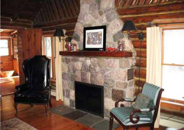 Charming log cabin offers year-round comfort, plus private beach on GWL Charming log cabin offers year-round comfort, plus private beach on GWL