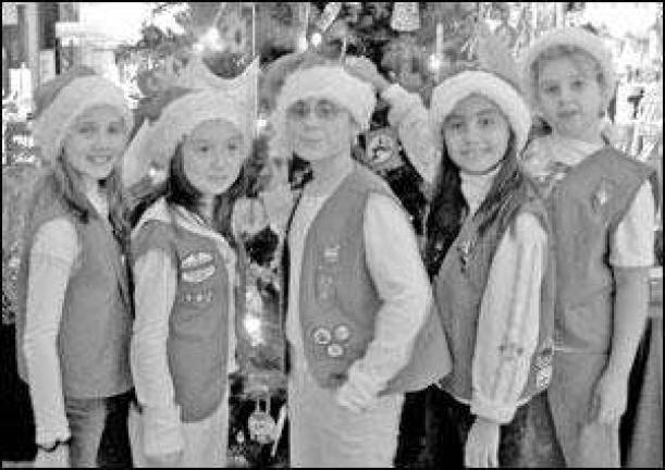 Santa's helpers collect donations Santa's helpers collect donations