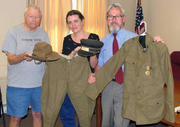 Quackenbush family member donates World War I uniform worn by ancestor Photos by Roger Gavan Howard Quackenbush World War I uniform, station master cap and other memorabilia from that era will be on display for the Village of Warwick's 150th anniversary in 2017. From left, 150th Anniversary Committee member George Arnott, project coordinator Mary Collura and Mayor Michael Newhard.