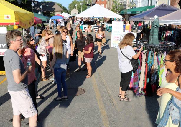 Activities on Railroad Green during last year's Ladies Night Out in Warwick. This year's event will take place Thursday, Aug. 22.