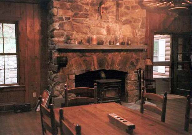 This wonderful property includes a pond, woods, waterfall, stream and three homes This wonderful property includes a pond, woods, waterfall, stream and three homes