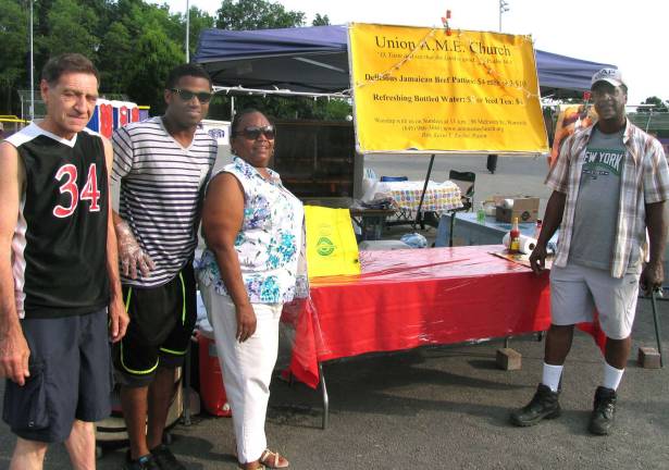 Warwick Firefighters host annual summer carnival Lots of food at this year's carnival: Members of Warwick's UME Church were on hand to serve tasty Jamaican Meat Patties. From left, Charles Mele, Justin Kirtin and his parents Mart and Janet Kirtin.