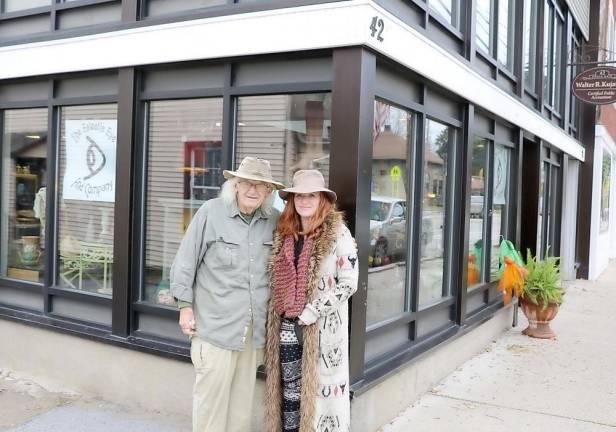 George Laurence and his daughter Alexis in front of The Eclectic Eye &amp; Company at 42 North Main St. in the Village of Florida