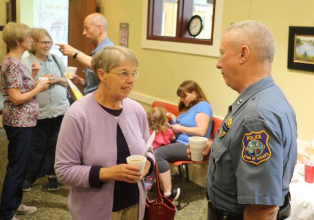Warwick Police hold 'Coffee with a Cop' at Albert Wisner Public Library Meredith Ferguson expressed her concern about the rising drug problem with Warwick Police Chief Tom McGovern Jr.