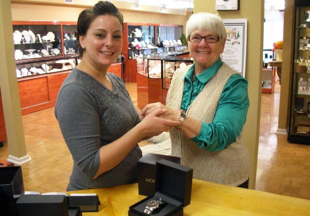 Pink Friday raffle winner announced Provided photo Sarah Schwartzberg (left), co-owner of Forever Jewelers in Warwick, presents the watches to Carol Stidworthy.