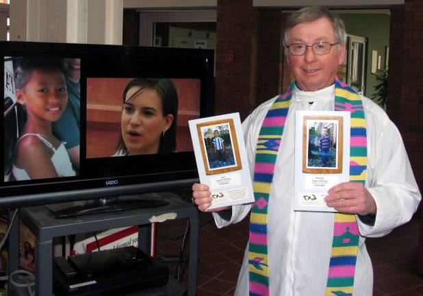 Parishioners respond to plea to help the poor Photo by Roger Gavan The Rev. William F. Martin