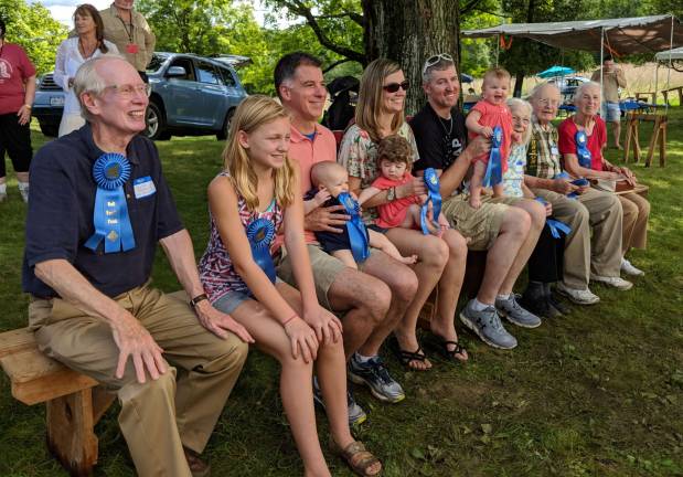 Hundreds gathered at one of America's longest-held family reunions Family members were awarded blue ribbons for traveling the furthest, youngest and oldest picnic guests and longest married. Photo by Julie Boyd Cole