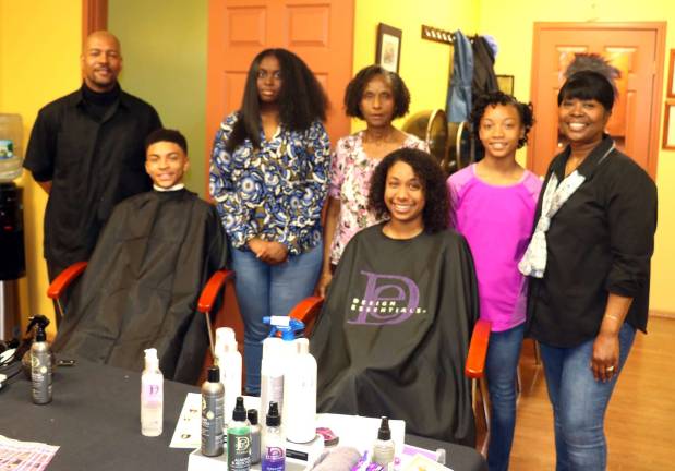 Gloria's Salon hosts Healthy Hair Open House Clinic Photo by Roger Gavan From left, stylist Gary Clark, clients and models Taylor Clark, Lia Reid, Emerline Clark, Amanie Milligan, Leonie Fullerton and owner Gloria Washington-Mines.