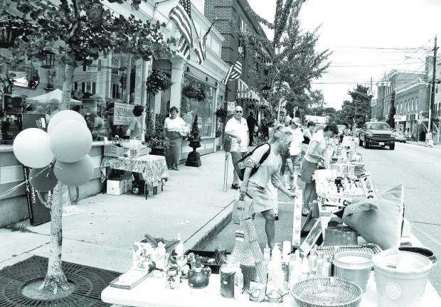 Sidewalk sale will feature 100s of vendors A scene from a previous Annual Sidewalk Sale.