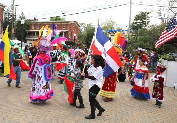 Warwick celebrates seventh annual Hispanic Heritage Day with a parade and ceremonies After arriving at Railroad Green visitors were treated to a colorful dance performance by the Comparsa de Chinelos San Pedr.