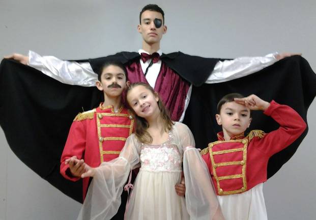 The holidays continue Photo credit: Sondra Hall Featuring Dennis Van Dunk as Drosselmeyer and the Mouse King; guest artist, Pierson Hall, as The Nutracker/Prince; Olivia Nosarzewski as Clara; and Ethan Hall as a Toy Soldier. Not pictured is Fiona Daly as The Snow Princess.