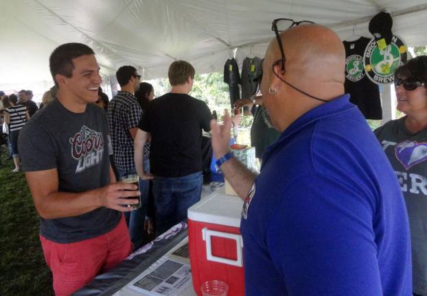 Pennings’ Brew Fest grows in its second year Steven Florkiewicz, of Warwick, gets sample of Newburgh Brewing's brown ale from Charlie Benedetti, part owner of the brewery.