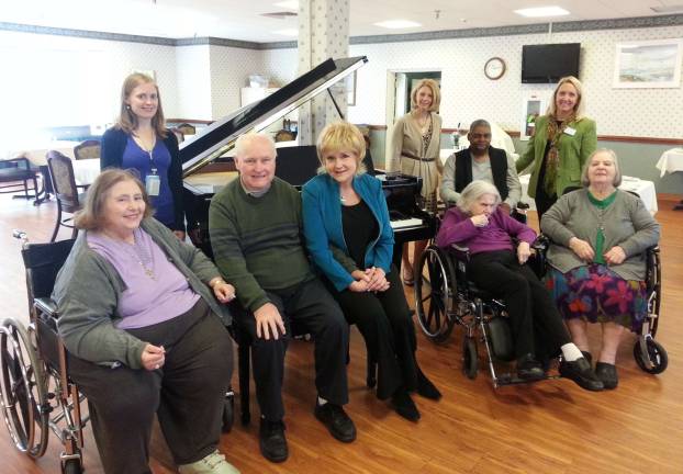 Elant residents enjoy classical music thanks to donation Marilynn Garzione, Janice Valentino and Melissa McCoy gather with Elant at Meadow Hill residents to enjoy the piano’s music.