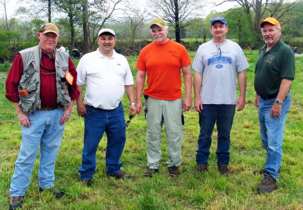 Take a Kid Fishing by the numbers: 400 trout; 150 kids; everyone a winner Member of the Warwick Valley Rod & Gun Club, which annually sponsors the program, include: Dave Levine, president; Kevin Unick, treasurer; Jerry Debold, chairman of Take a Kid Fishing Day; and John Buckley, secretary.