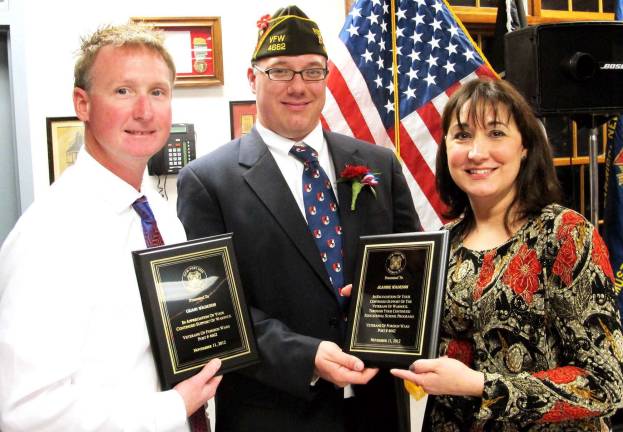 VFW Post 4662 hosts dinner Photo by Ed Bailey Warwick Valley Post 4662 Commander Gordon Cooke, center, presents awards to Craig Wadeson, owner of Wadeson Home Center in Warwick, and Warwick Village Justice Jeanine G. Wadeson "in recognition of your continued support of the veterans of Warwick through your continued educational school programs.î