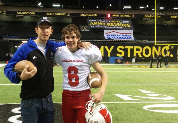 Warwick freshman punts for Team Canada at Youth Eastbay All America Bowl Pictured here are Davis Brief, a freshman at Warwick Valley High School, and his father, Eric Brief, at the Alamo Dome in San Antonio, Texas, where Davis punted for Team Canada in the Youth Eastbay All America Bowl on Jan. 5.