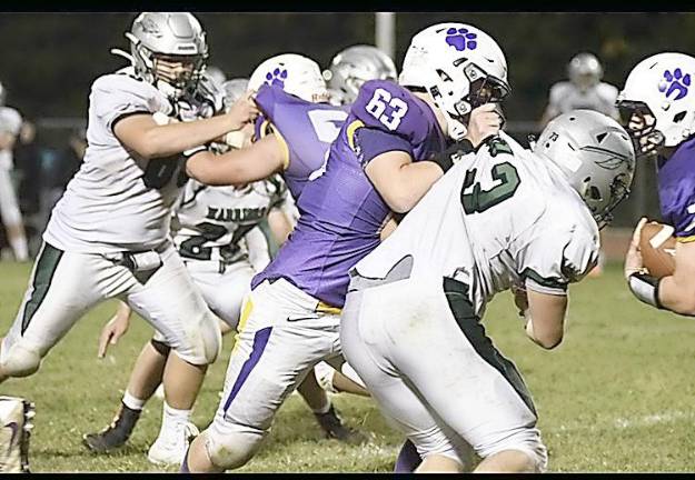 Center Brian Laroe (#63) in action against Minnisink Valley the last time Warwick Valley played football. The three-year varsity football player has committed to St. Lawrence University in upstate Canton. Photo provided by Athletic Director Gregory Sirico.