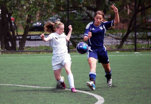 Nirvana Legacy grows with each victory Photo by Pam Walker Maegan Villa, left, strikes a blow for Nirvana Legacy, a girls under-14 soccer team with players from Washingtonville, Monroe, Warwick, Newburgh, Ellenville, Red Hook, Fishkill, Pine Bush and Hopewell Junction.
