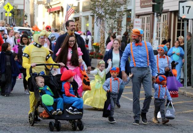 Once the Halloween merry-makers reached Railroad Avenue, they dispersed and headed out for traditional trick or treating.