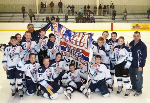 Hockey Saints advance to USA Hockeys National Tournament in Virginia Photo provided by Vinny Durante The Ramapo Saints Pee-Wee hockey team, which draws its 11 and 12 year-old players from across Orange County, N.Y., and Pike County, Pa., are headed to the USA Hockey National Tournament in Reston, Va., later this month. Pictured here, beginning with those standing are: Mike Hermancin (Cold Spring), Justin Betcher (Newburgh), Cole Garabed (Warwick), Head Coach Steve Pelosi (Monroe), Ryan Malota (Warwick), Dante Durante (Campbell Hall), Noah Daigle (Warwick), Conor Havey (Cornwall), Matt Cavallaro (Matamoras, Pa.), Donnie Feldman (Highland Falls) and Coach Paul Cavallaro (Matamoras, Pa.). Kneeling are: Nick Pelosi, (Monroe), Rhett Padgett (Millrift), Aaron Bohlinger (Walden), Mark Amatetti, (Monroe), and Mike Sacchi, (Washingtonville). Not available for photo Coach Steve Garabed (Warwick) and Coach Rob Malota (Warwick).