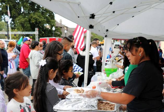 Warwick celebrates seventh annual Hispanic Heritage Day with a parade and ceremonies Warwick Reformed Church Pastor Rev. Linden DeBie first blessed the food and throughout the evening everyone was invited to sample the free tastings of cuisine from Honduras, Guatemala, Mexico, the Dominican Republic, Puerto Rico and El Salvador.