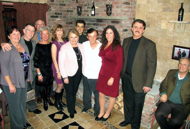 Mangiare bene Photo by Roger Gavan From left, Deborah and Michael Sweeton, Town of Warwick supervisor; Michael Johndrow, executive director of the Warwick Valley Chamber of Commerce; Sue Filingeri, Jacqueline Johndrow, Greenwood Lake Mayor Barbara Moore, Chris Rapaj, West Milford Mayor Bettina Bieri, Joseph Filingeri and James Moore. Present at the dinner but not available for the photo: West Milford Township Administrator Nancy Gage.