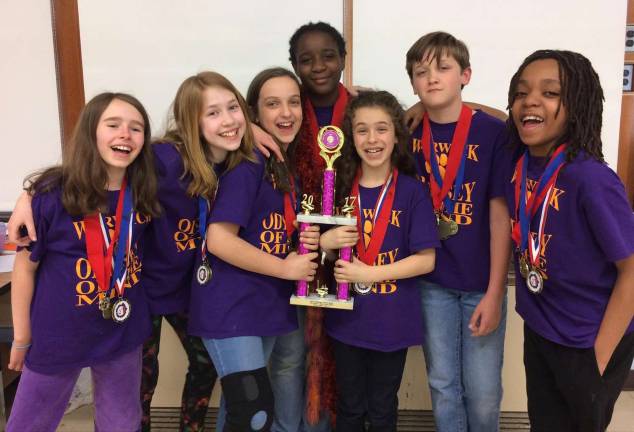 The odyssey continues for two Warwick teams Photos by Louise Hutchison Sanfordville Elementary School School Odyssey of the Mind team: From left: Ava Gell, Olivia Holland, Julie Woods, Kooki Aryeetey, Alexa Woods, Killian Bauman and Jay Seward.