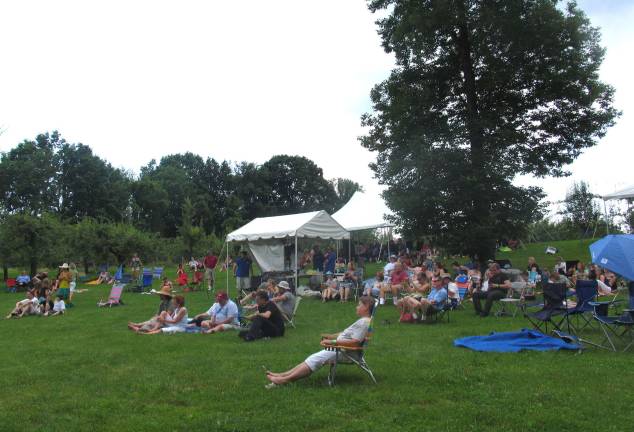 Music festival raises money for hippotherapy center Photos by Roger Gavan Guests had a choice of seating on the picturesque grounds of the Warwick Valley Winery.