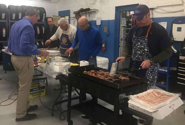 Leo Kaytes Ford thanks local veterans Photo provided by Leslie B. Culkin Getting ready to serve the local veterans at Leo Kaytes Ford last Friday are: Rick Braun, service manager, Greg Thompson, Ford Company, Tim Berryman and Tom Grimaldi of Ford Credit and Eddie Howie, parts manager.