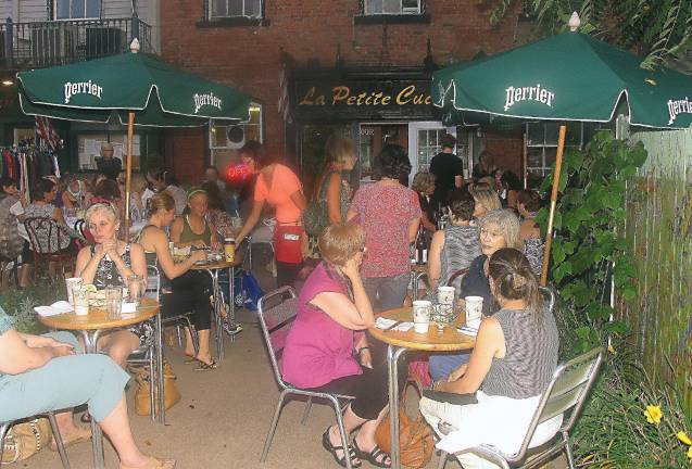 Sixteenth annual Ladies Night Out held Thursday evening August 22 Photos by Roger Gavan Courtyard restaurants on Railroad Avenue were filled.