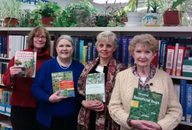 Shown here at the Village of Florida Library are Cathy Garofalo, Florida Librarian Madelyn Folino, Marcela Gross and President Gert Galligan, president of the Warwick Valley Gardenners.